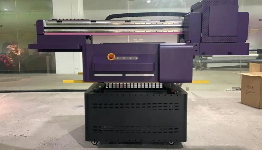 Close-up of the Multifunctional LED UV Flatbed Printer showing the printing mechanism and precision controls